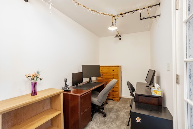 home office with light colored carpet