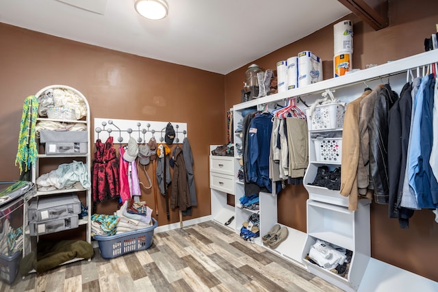 spacious closet with wood finished floors