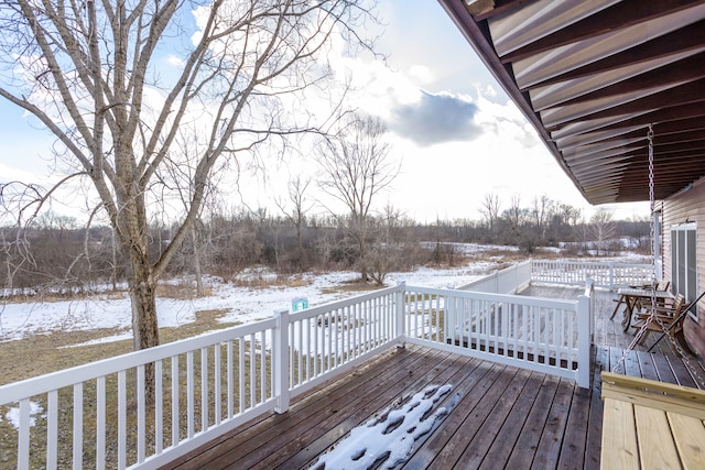 view of snow covered deck