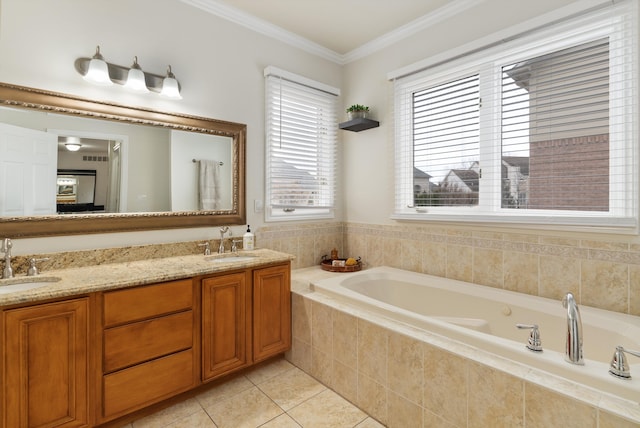 bathroom with ornamental molding, a sink, a bath, and tile patterned floors