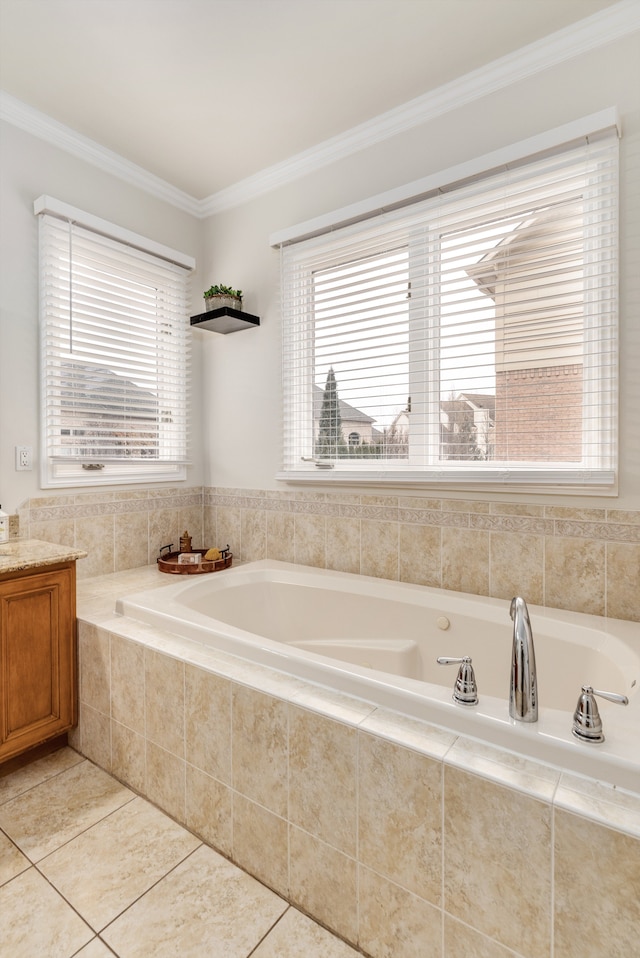 bathroom with a bath, crown molding, and tile patterned floors