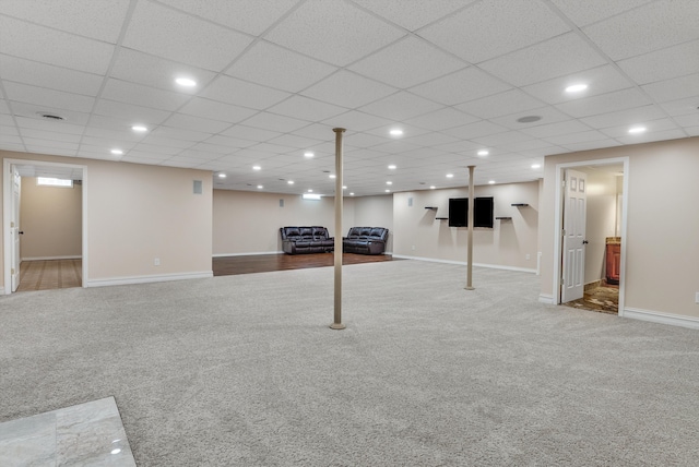 finished basement with carpet, baseboards, and recessed lighting