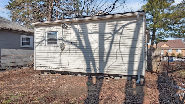 view of outdoor structure featuring fence