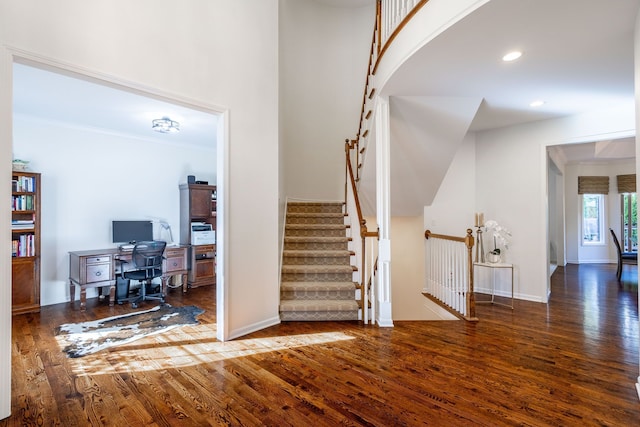 entryway featuring crown molding, recessed lighting, hardwood / wood-style flooring, and baseboards