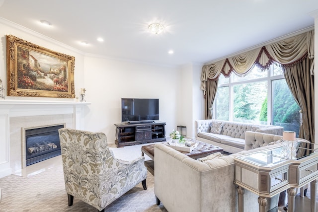 carpeted living area with ornamental molding, recessed lighting, and a fireplace