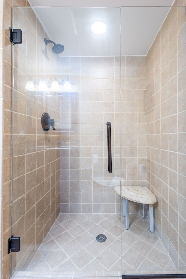 full bathroom with a shower stall