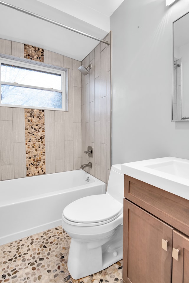 full bath with shower / bathing tub combination, vanity, and toilet