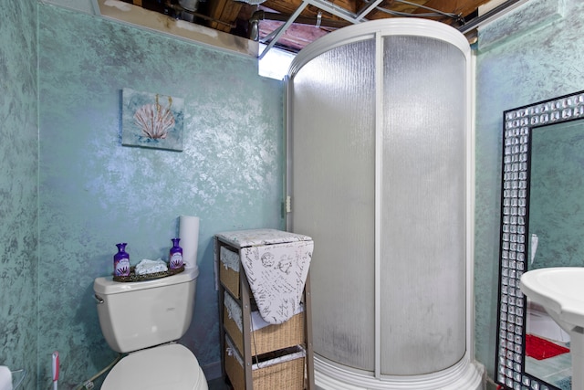 full bath with a stall shower and toilet