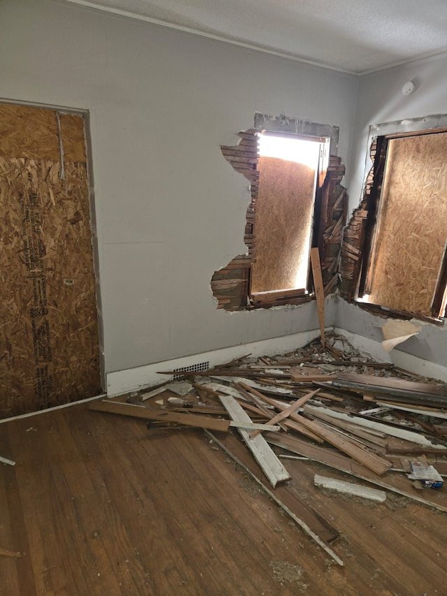 interior space with hardwood / wood-style floors