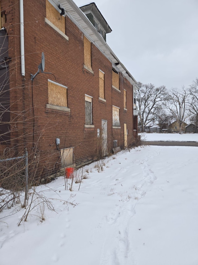 view of snow covered property