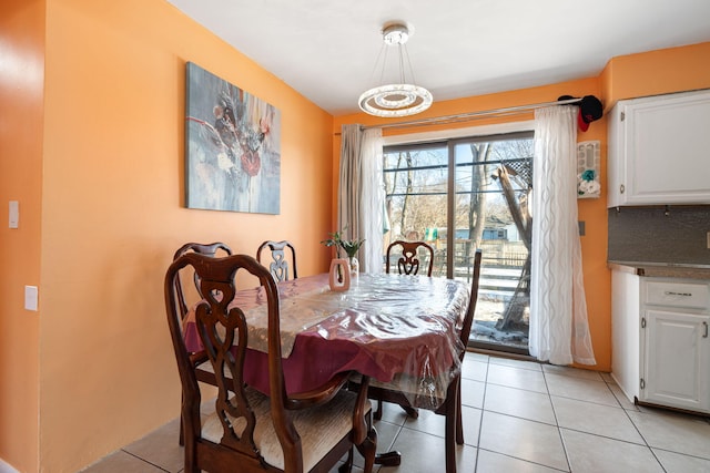 dining room featuring light tile patterned floors