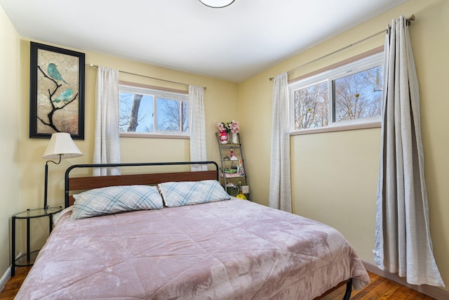 bedroom featuring wood finished floors