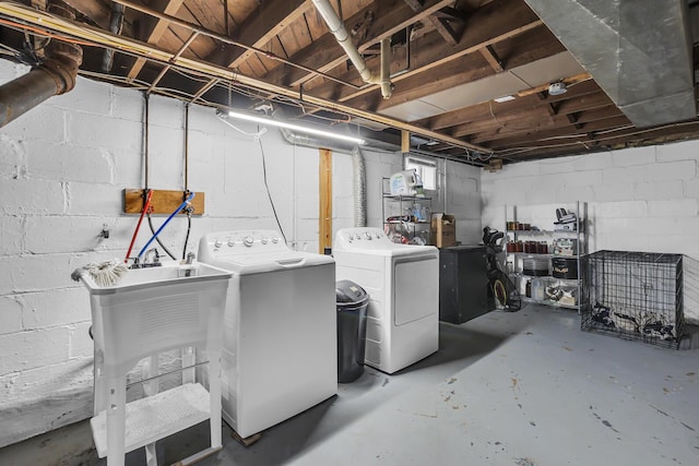 unfinished below grade area featuring separate washer and dryer