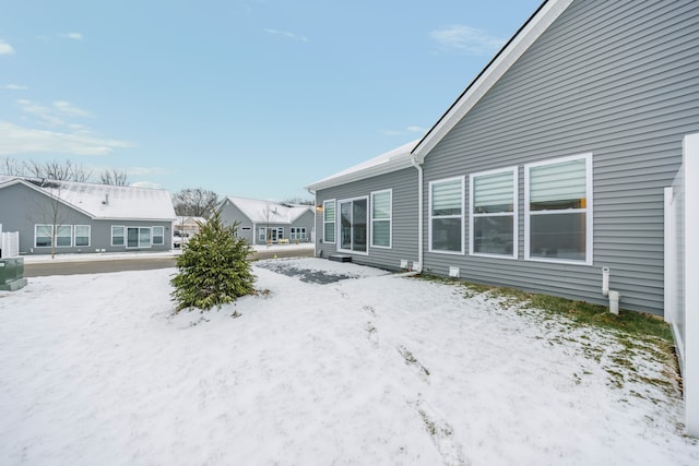 view of yard covered in snow