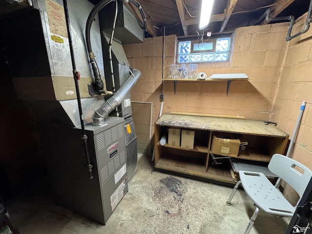 utility room with heating unit