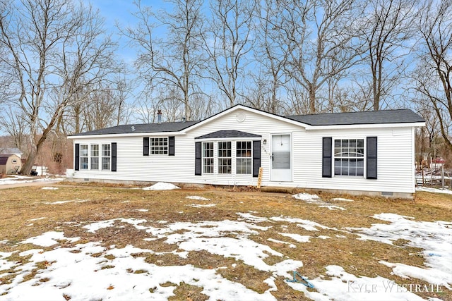 view of front of home featuring crawl space