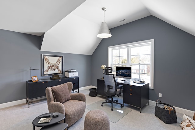 office with lofted ceiling, carpet flooring, and baseboards