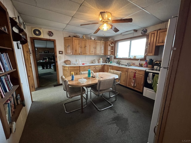 kitchen featuring light countertops, range with electric cooktop, open shelves, and a paneled ceiling