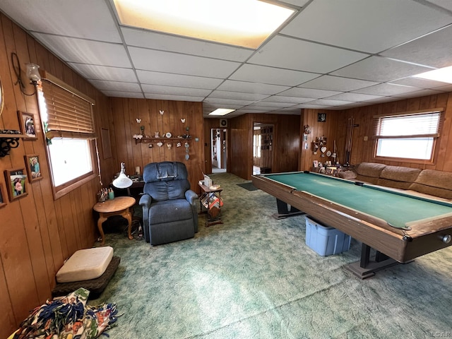 game room featuring carpet floors, wood walls, a drop ceiling, and pool table