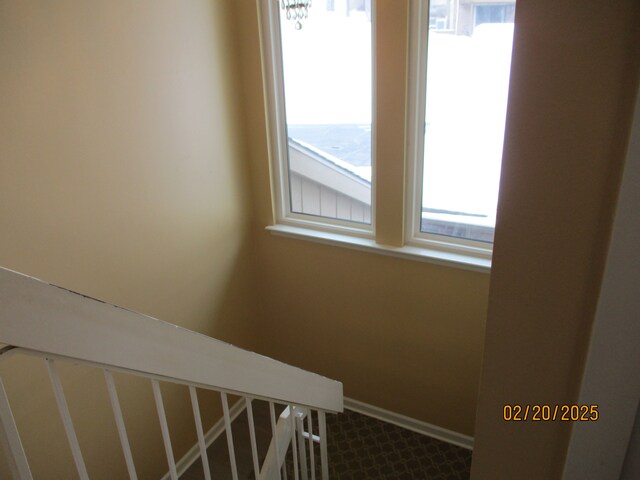 stairway with baseboards