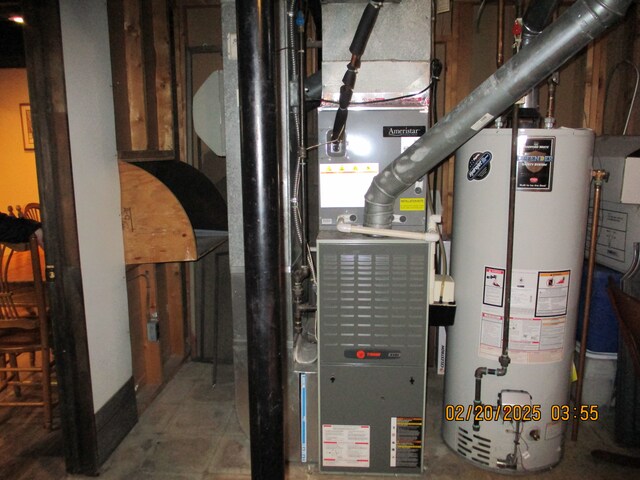 utilities with gas water heater and heating unit