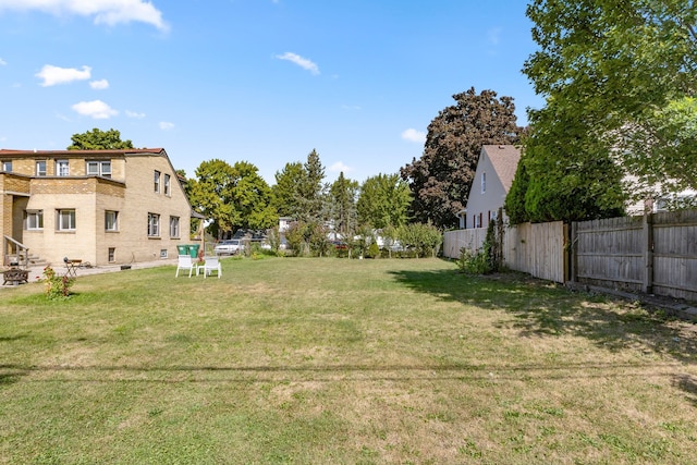 view of yard with fence