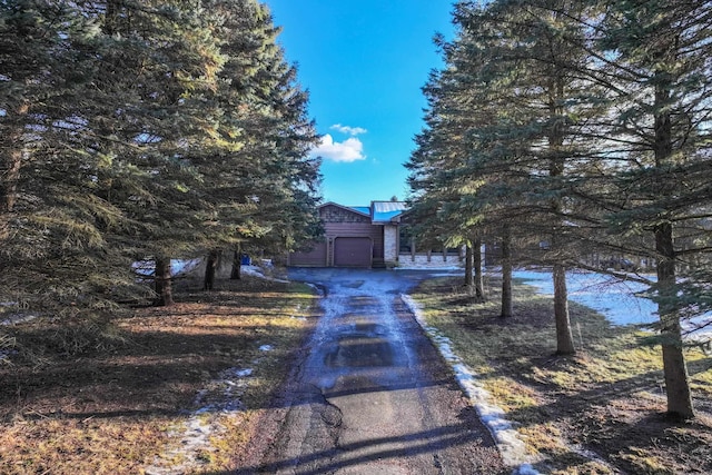 view of front of house featuring driveway and an attached garage