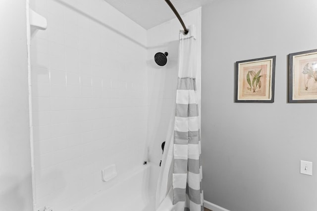 5235 Lahring Rd, Linden, MI 48451 - bathroom with baseboards and shower / bath combination with curtain