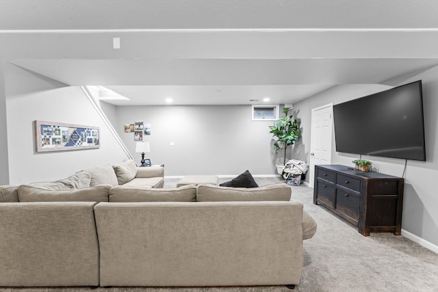 living area featuring recessed lighting, light colored carpet, and baseboards