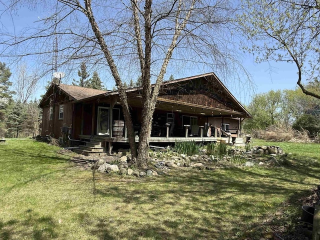 5235 Lahring Rd, Linden, MI 48451 - view of home's exterior featuring a yard and a porch