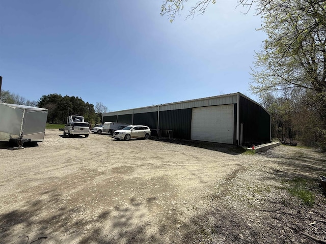 5235 Lahring Rd, Linden, MI 48451 - exterior space with a detached garage