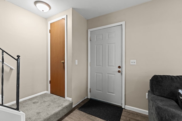 foyer entrance with baseboards