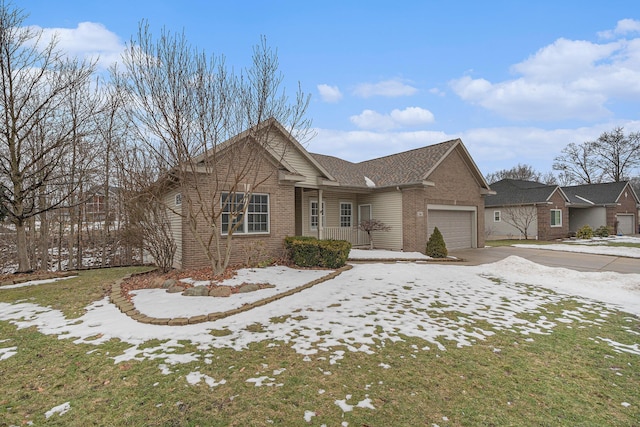 ranch-style home featuring concrete driveway, brick siding, and an attached garage