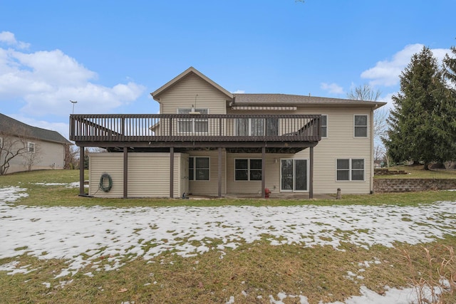 back of property featuring a deck