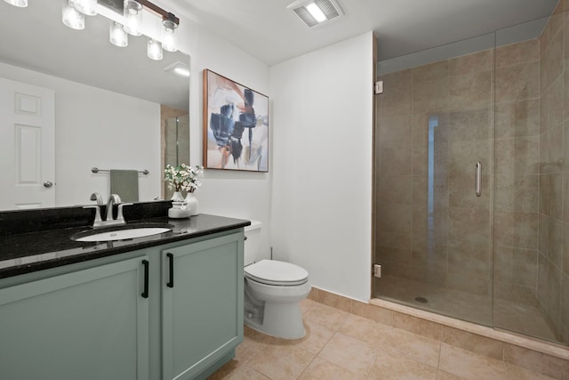 bathroom featuring visible vents, toilet, a shower stall, vanity, and tile patterned flooring