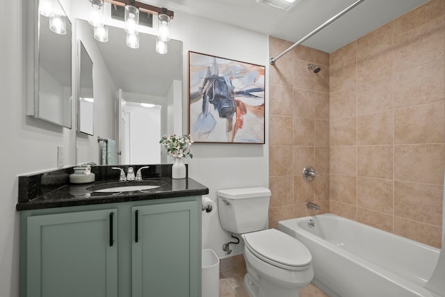 full bath with baseboards, tub / shower combination, vanity, and toilet