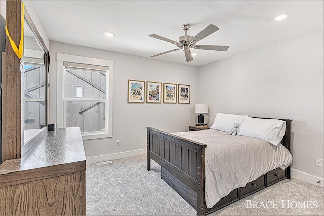 carpeted bedroom with a ceiling fan, recessed lighting, visible vents, and baseboards