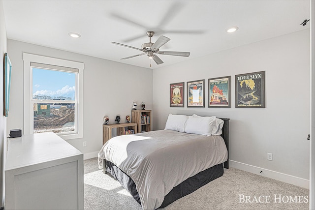 bedroom with light carpet, baseboards, and recessed lighting