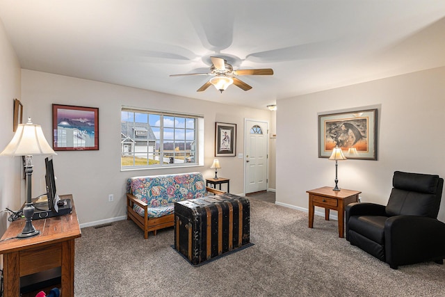 living room with carpet, visible vents, and baseboards