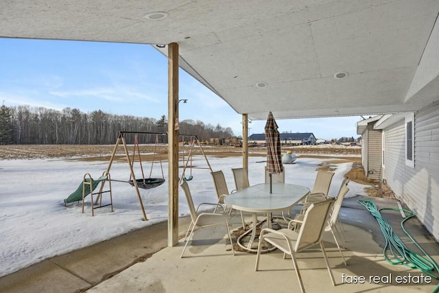 view of patio featuring outdoor dining space