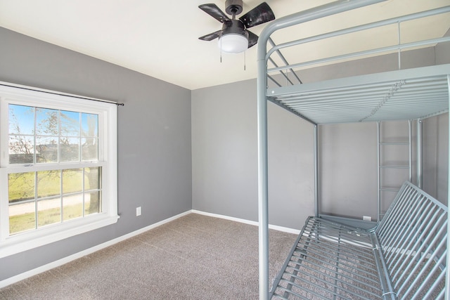 interior space with a ceiling fan