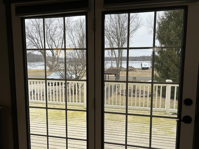 doorway featuring a water view