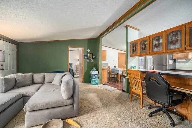 interior space featuring crown molding, lofted ceiling with beams, and a textured ceiling