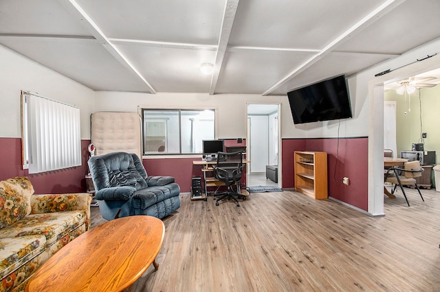 office with ceiling fan and wood finished floors