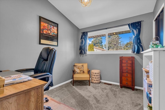 home office with carpet flooring, visible vents, baseboards, and lofted ceiling