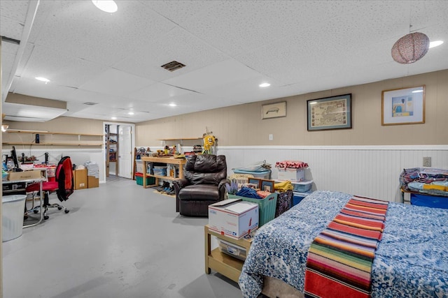 interior space with visible vents, recessed lighting, and a drop ceiling