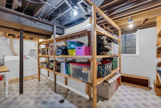 storage room featuring washing machine and dryer