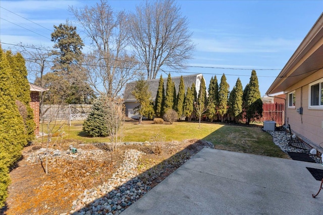 view of yard featuring a patio area and fence