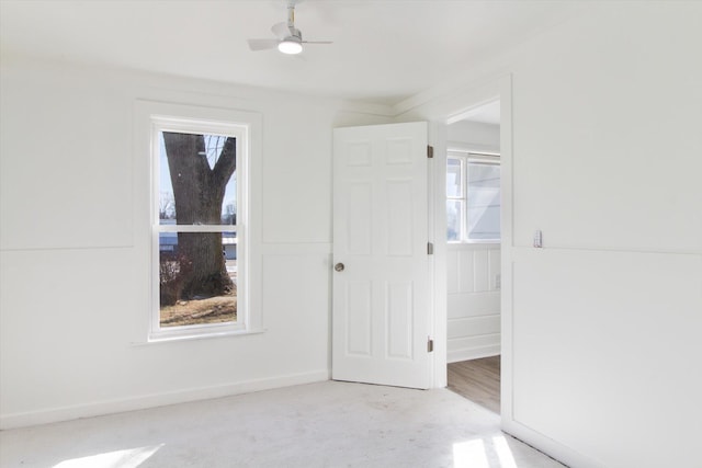 225 E Home St, Edmore, MI 48829 - unfurnished bedroom with light carpet and baseboards