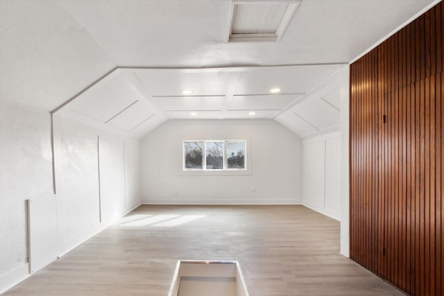 225 E Home St, Edmore, MI 48829 - additional living space featuring attic access, light wood-type flooring, vaulted ceiling, and recessed lighting